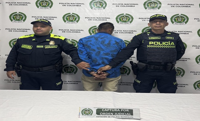 Dos policías un capturado mediante orden judicial
